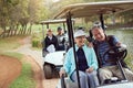 Out for a drive. a smiling senior couple riding in a cart on a golf course. Royalty Free Stock Photo