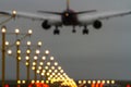 Out of focus airliner and runway lights Royalty Free Stock Photo