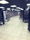 Out of focus bookstore. Blur shelves with books Royalty Free Stock Photo