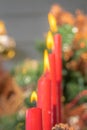 Out of focus photo. Blurred. Advent. Christmas cards. Four red burning candles. Decorated Christmas tree background. Christmas Royalty Free Stock Photo