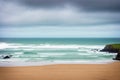 Out of focus is the view over the beach at Bude in Cornwall.