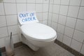 Out Of Order Text On Toilet Bowl Royalty Free Stock Photo