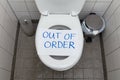 Out Of Order Text On Toilet Bowl Royalty Free Stock Photo