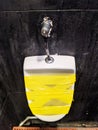 Out of order Urinal in a public men bathroom Royalty Free Stock Photo