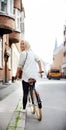 Out for a ride. Shot of a pretty young woman on her bicycle in the city. Royalty Free Stock Photo