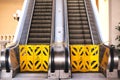 Out of service escalator with yellow gates Royalty Free Stock Photo