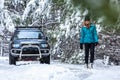 Out in snow covered forest with 4wd ute