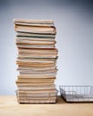 Trays on desk with ambitious stack of never ending pape rwork