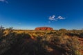 Outback, Australia - November 12, 2022: Sunrise at the Majestic Uluru or Ayers Rock at in the Northern Territory, Australia. The Royalty Free Stock Photo