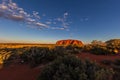 Outback, Australia - November 12, 2022: Sunrise at the Majestic Uluru or Ayers Rock at in the Northern Territory, Australia. The Royalty Free Stock Photo