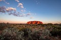 Outback, Australia - November 12, 2022: Sunrise at the Majestic Uluru or Ayers Rock at in the Northern Territory, Australia. The Royalty Free Stock Photo