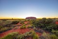 Outback, Australia - November 12, 2022: Sunrise at the Majestic Uluru or Ayers Rock at in the Northern Territory, Australia. The