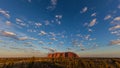 Outback, Australia - November 12, 2022: Sunrise at the Majestic Uluru or Ayers Rock at in the Northern Territory, Australia. The Royalty Free Stock Photo