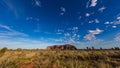 Outback, Australia - November 12, 2022: Sunrise at the Majestic Uluru or Ayers Rock at in the Northern Territory, Australia. The Royalty Free Stock Photo