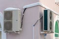 An outdoor air conditioner unit consisting of two fans. A large industrial air conditioner on the wall of a store or enterprise. Royalty Free Stock Photo