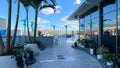 The outdoor amenities with a swimming pool, cabanas and lounge chairs at the Wave Hotel at Lake Nona in Orlando, Florida