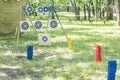 Outdoor archery targets on grass field surrounded by forest in the summer. Royalty Free Stock Photo