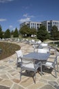 Outdoor architecture with tables and chairs view Royalty Free Stock Photo