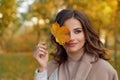 Outdoor atmospheric lifestyle portrait of young beautiful lady. Warm autumn Royalty Free Stock Photo