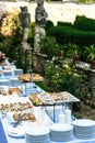 Outdoor banquet table with many snacks and delicacies Royalty Free Stock Photo