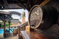 Outdoor bar with a stylized wine barrel near a medieval style restaurant in a luxury boutique hotel Royalty Free Stock Photo
