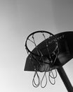 Outdoor basketball hoop against clear sky in monochrome Royalty Free Stock Photo