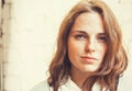 Outdoor beauty. Portrait of smiling young and happy woman with freckles. Royalty Free Stock Photo