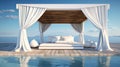 Outdoor bed in front of the ocean with white curtains Royalty Free Stock Photo