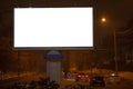 Outdoor billboard blank for advertising poster with mockup, night city time. Royalty Free Stock Photo