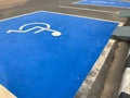 Outdoor blue Handicap parking spot Royalty Free Stock Photo