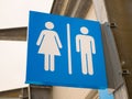 Outdoor blue toilets sign Royalty Free Stock Photo