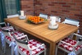 Outdoor Breakfast Table with Tray of Florida Oranges Royalty Free Stock Photo