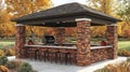 Outdoor brick kitchen pavilion with seating and grill Royalty Free Stock Photo