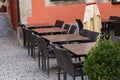 Outdoor brown cafe tables and chairs