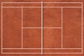 Outdoor brown tennis ground court in public park.