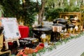 Outdoor buffet featuring a variety of vibrant colored dishes set up at an outdoor event venue Royalty Free Stock Photo