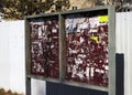 Street Bulletin Board with tattered sheets