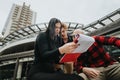 Outdoor business meeting with diverse colleagues discussing documents Royalty Free Stock Photo