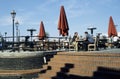 Outdoor cafe and eating area with people