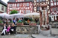 Outdoor cafe, Knight of Hattstein statue, town centre of Limburg, Germany