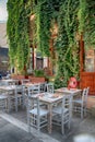 Outdoor cafe on the Old Town street in Rethymno, Greece. Royalty Free Stock Photo