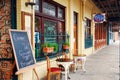 An outdoor cafe sets an inviting table