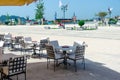 Outdoor cafe on a street of typical greek Royalty Free Stock Photo