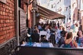 Outdoor cafes of Melbourne full of people