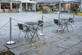 Outdoor cafÃÂ© seating in urban plaza Royalty Free Stock Photo