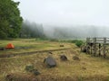 Outdoor camp area background on a foggy day