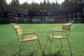 Outdoor chairs on lawn Royalty Free Stock Photo
