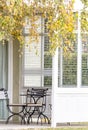 Outdoor Chairs and Table on White Porch Royalty Free Stock Photo