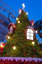 Outdoor christmas treet with colorful lights and decorations