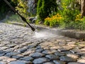 Outdoor cleaning using pressure washer Royalty Free Stock Photo